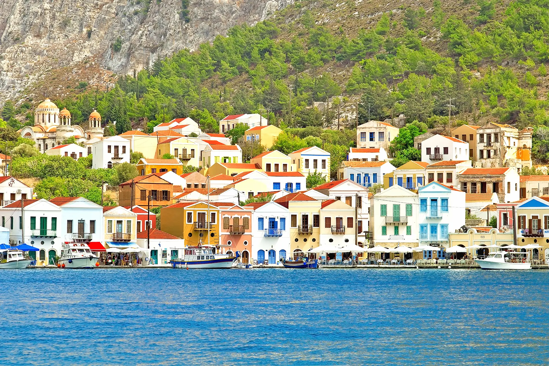 Places to visit in Kastellorizo — discover the Blue Cave, Lycian tombs, and waterfront tavernas on Kastellorizo island, Greece.