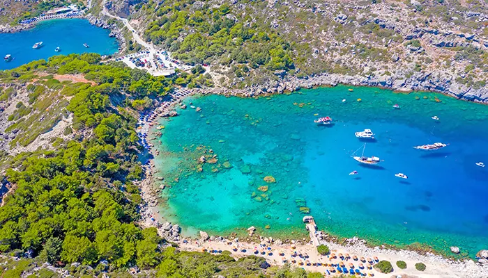 Swim at Anthony Quinn Bay in Rhodes island.