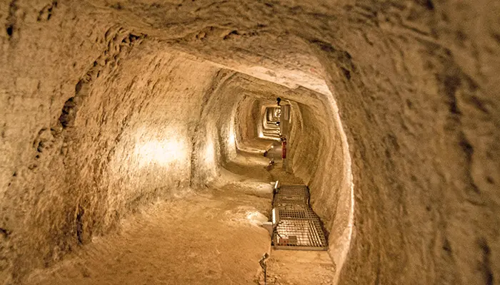 Walk through the Tunnel of Eupalinos in Samos island.